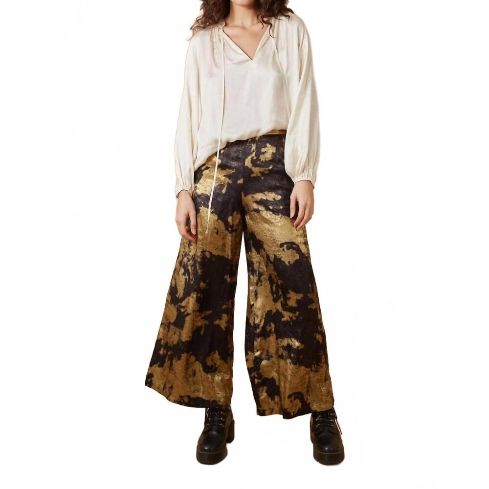 NEW TRAFFIC PEOPLE loretta flared trousers in black/gold